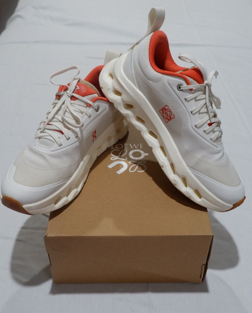 LOEWE × On Cloudtilt 2.0 - White/Orange (Category: Sneakers & Footwear) located in Malaybalay. Submitted by by.mady (Listing ID 1465688833, Image 1). Description: LOEWE × On Cloudtilt 2.0 — White/Orange Selling my personal pair. Used only a few times and still in very good condition. Size: Women’s US 8.5 / EU 40 / UK 6.5 / JP 25.5 Color: White / Orange On Style Code: 3WE10871562 LOEWE Style Code: L929282X29 Comes complete with original LOEWE × On