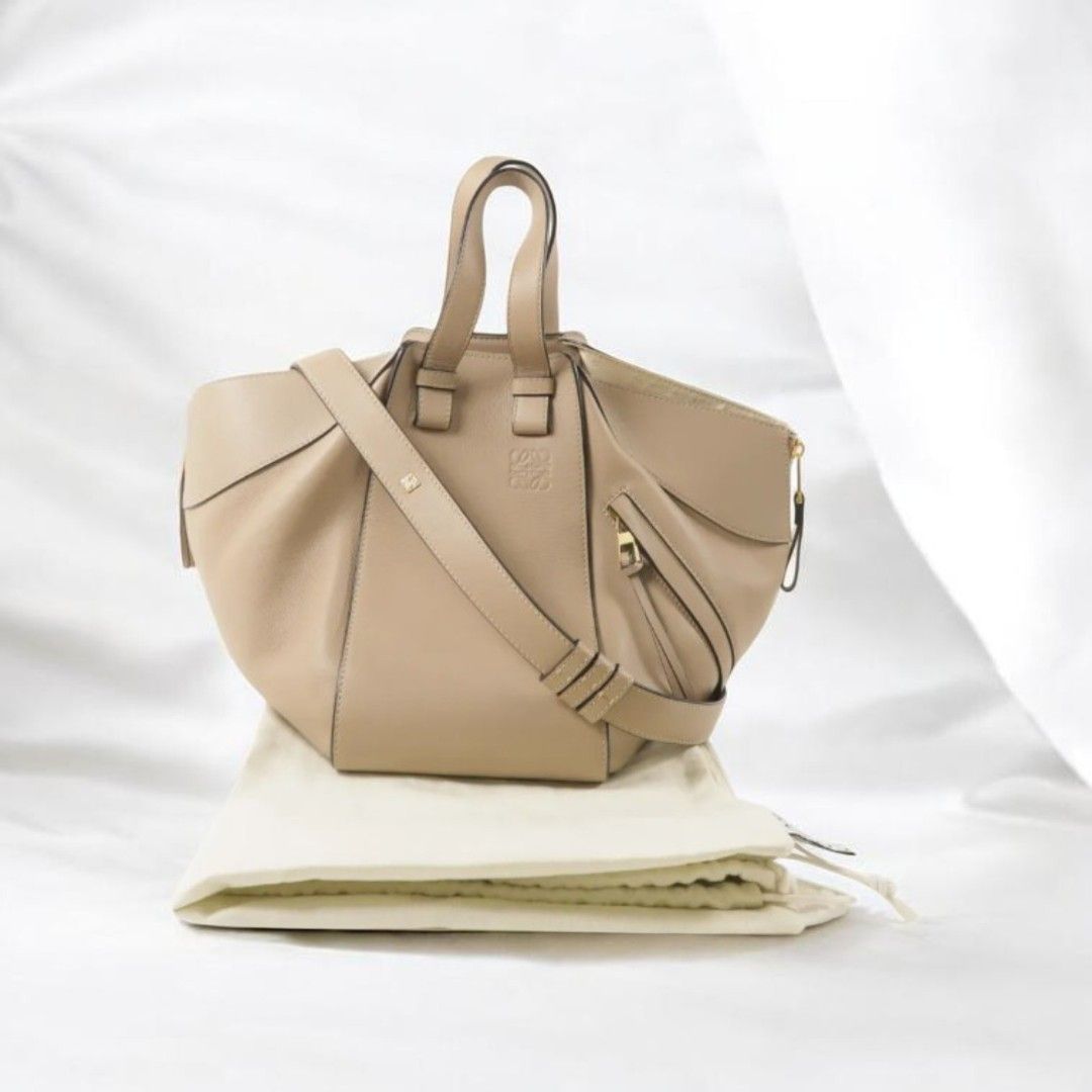 LOEWE HAMMOCK SMALL SIZE (Category: Shoulder Bags) located in Manila. Submitted by astudio29 (Listing ID 1465656842, Image 1). Description: ❤️PLEASE READ FIRST❤️ 🤎 beige color 🤎grained soft leather 🤎size: medium 29cm length / height 24cm 🤎inclusions : dustbag and env lope pouch only 🤎 ukay sourcekaya mura. 💜💙NEGOTIABLE PRICE UNLESS STATED AS LAST PRICE SALE ❤️💜💙 🛑NO RETURNS OR EXCHANGES‼️ 🛑MODE.OF.PAYMENT GCAS(NO TO GCASH PROTECT) 🛑PA
