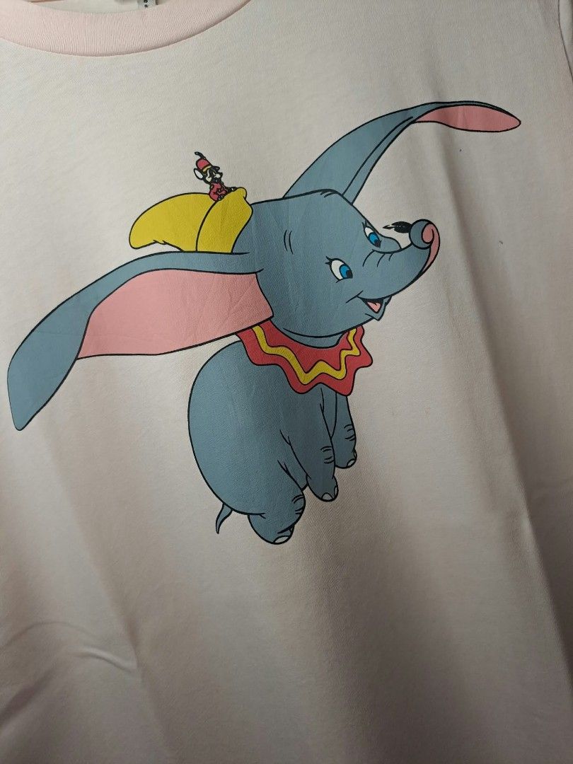 Loewe x Disney Dumbo (Category: Shirts) located in Quezon City. Submitted by yaseen73 (Listing ID 1465653969, Image 2). Description: Loewe x Disney Dumbo Wearing Size : Small - Medium Color Rate : 9.9/10 - Issue : Stain (See Photo) - Condition : 5/5 350 only Shipped Via J&T Express MOP : G C A S H B A N K T R A N S F E R Seller's Location : 📍Brgy. Pansol, Q.C.
