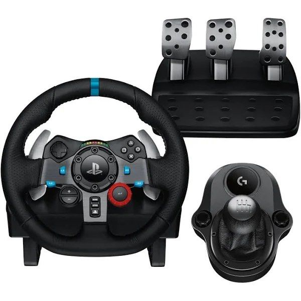 Logitech G29 Driving Force Racing Wheel and Pedals (Category: Controllers) located in Cavite. Submitted by cutesyyyy (Listing ID 1465583636, Image 1). Description: firm price already di ko na sinama price ng gear stick - Complete Logitech G29 racing setup (wheel, floor pedals, and 6-speed shifter) - Powerful dual-motor force feedback in great working condition - Premium hand-stitched leather steering wheel and stainless steel paddle shifters - Se