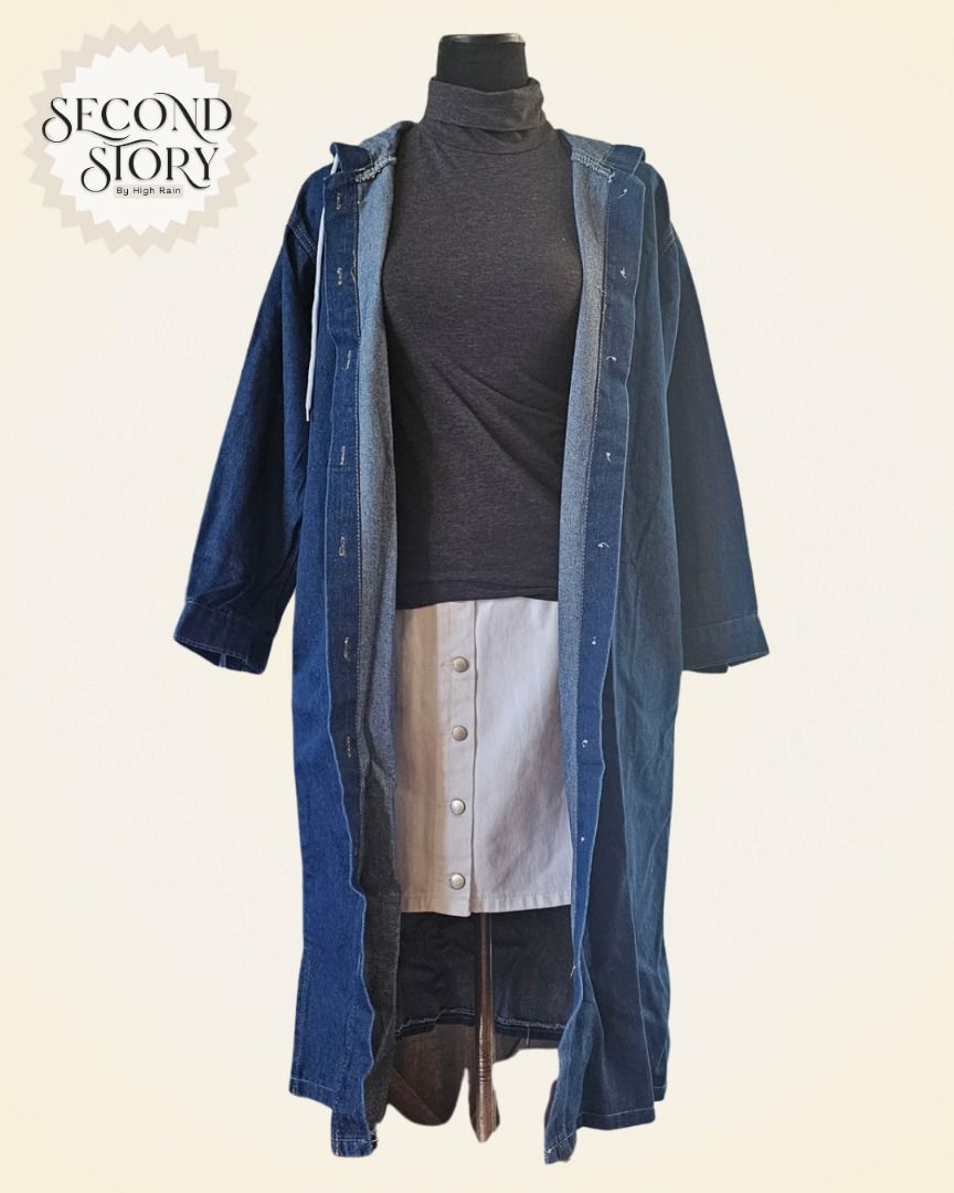 Long Denim Trench Coat with Hood (Category: Coats, Jackets and Outerwear) located in Cavite. Submitted by secondstorybyhighrain (Listing ID 1465598202, Image 2). Description: - Color: Dark blue denim wash - Design: Attached hood with white drawstring cords, full button-up front closure - Fit: Relaxed, long sleeves, extends past the knees - Style: Great layering piece for cooler weather B 37 L 44 .