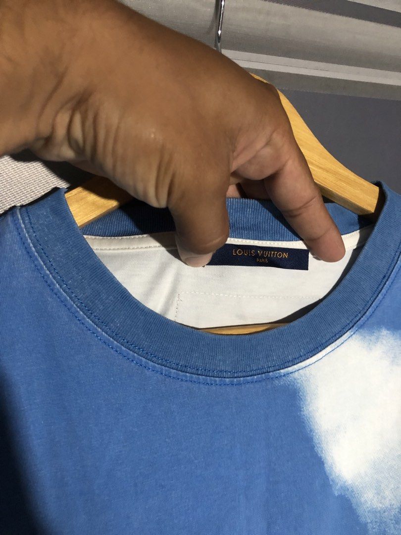 Louis Vuitton Cloud Blue (Category: Tshirts & Polo Shirts ) located in Ormoc. Submitted by lunzagalan01366 (Listing ID 1465732468, Image 3). Description: - Brand: Louis Vuitton - Item: Cloud Print T-Shirt - Color: Blue and White - Size: S on Tag Fits Large - Material: 100% Cotton - Origin: Made in Italy - Condition: Pristine with clean tags attached inside collar and side seam - Details: Distinct all-over cloud graphic, subtle embroidered chest l