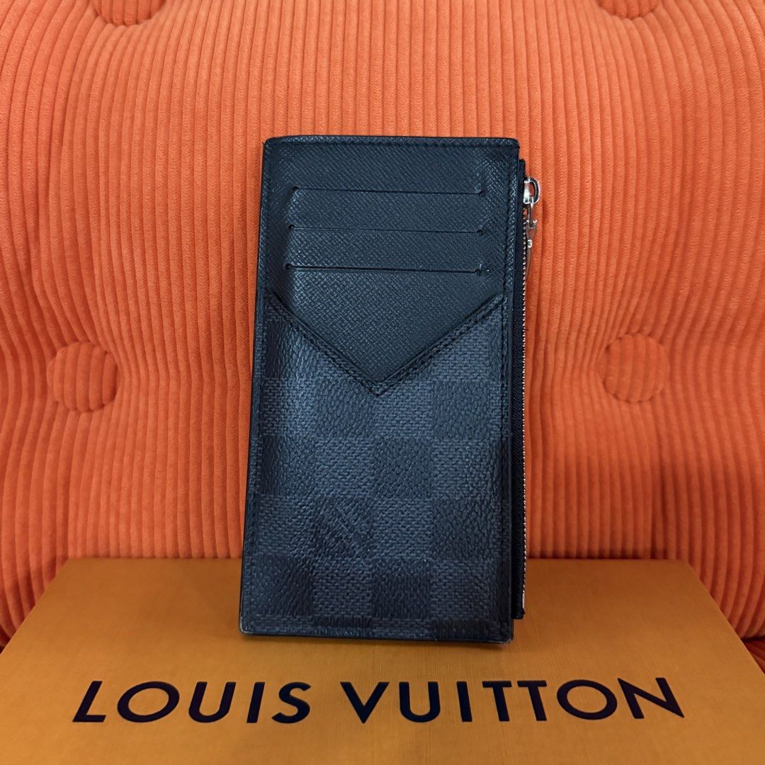 Louis Vuitton Damier Graphite Coin Card Holder (Category: Luxury Bags & Wallets) located in Paranaque City. Submitted by megsluxefinds (Listing ID 1465709562, Image 1). Description: Condition: Rank A — Good Condition Price: ₱21,000 Inclusions: Box, Dust Bag & Paper Bag Classic. Practical. Slick. IG: @megsluxefinds DM to make it yours today! 🖤 Meg’s Luxe Finds is not affiliated with Louis Vuitton or any of the brands featured. All trademarks belo