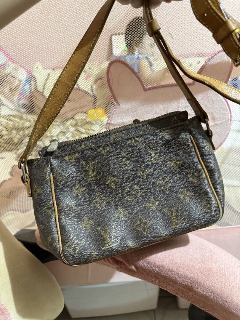 Louis Vuitton Monogram Canvas Crossbody Bag (Category: Luxury Bags & Wallets) located in Obando. Submitted by rizellejen (Listing ID 1465598950, Image 2). Description: - Authentic Monogram canvas crossbody bag - Adjustable leather strap with normal darkening from wear - Front flap pocket with magnetic closure - Secure main zip compartment with red fabric lining - LV branded hardware on zipper pull - Sturdy canvas body with multiple practical stor