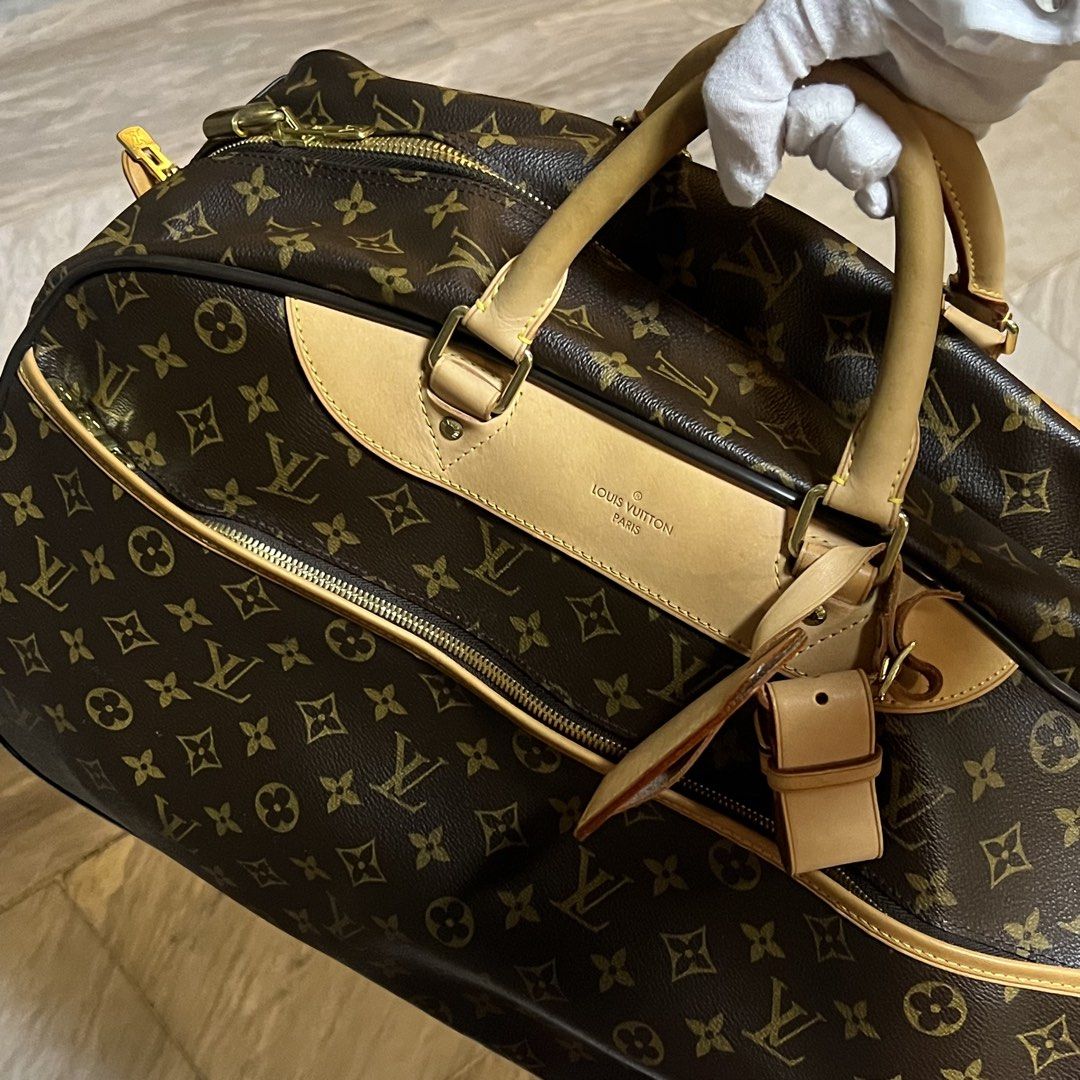 Louis Vuitton Monogram Canvas Rolling Duffle Bag (Category: Luxury Bags & Wallets) located in Imus. Submitted by shopatsens (Listing ID 1465678365, Image 1). Description: - Authentic Louis Vuitton travel bag in Classic Monogram canvas - Natural cowhide leather trim and comfortable top handles - Elegant gold-tone hardware throughout - Convenient front zipper pocket and secure dual top zip closure - Brown fabric interior lining featuring handy slip