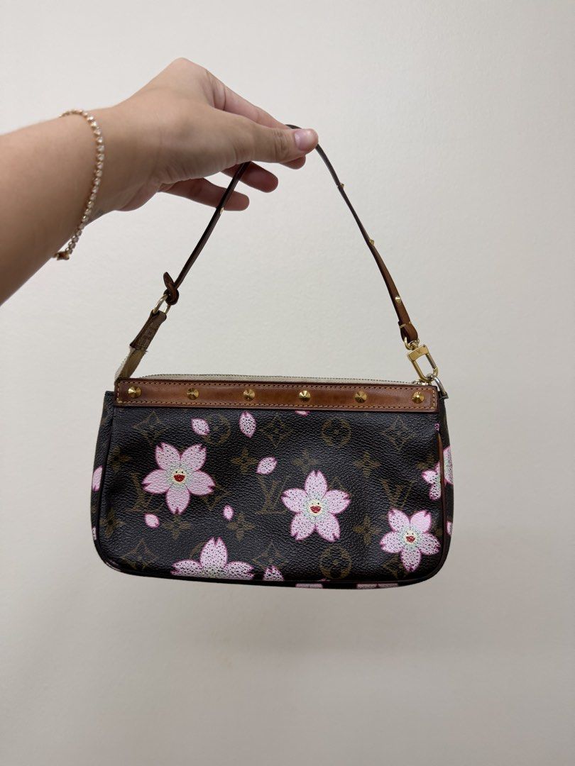 Louis Vuitton Monogram Cherry Blossom Pochette (Category: Luxury Bags & Wallets) located in Manila. Submitted by tashvintagefinds (Listing ID 1465635764, Image 2). Description: - Authentic Louis Vuitton Monogram Cherry Blossom pouch - Visible signs of usage but bag is perfectly okay - Honey patina vachetta - slightly nego.