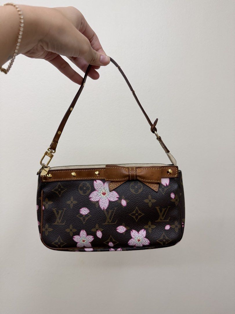 Louis Vuitton Monogram Cherry Blossom Pochette (Category: Luxury Bags & Wallets) located in Manila. Submitted by tashvintagefinds (Listing ID 1465635764, Image 1). Description: - Authentic Louis Vuitton Monogram Cherry Blossom pouch - Visible signs of usage but bag is perfectly okay - Honey patina vachetta - slightly nego.