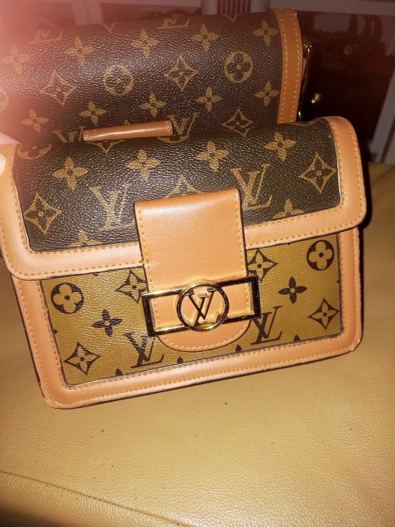 Louis Vuitton Monogram Crossbody Handbag (Category: Luxury Bags & Wallets) located in Quezon City. Submitted by jhanafionah (Listing ID 1465615309, Image 2). Description: Take all for just one price! only 3200 for all! Pamigay sale.. preloved so manage your expectations.Malinis and very good condition pa Monogram pattern in two tones of brown with tan leather trim. Flap closure featuring a gold LV clasp. Structured rectangular shape with clean st