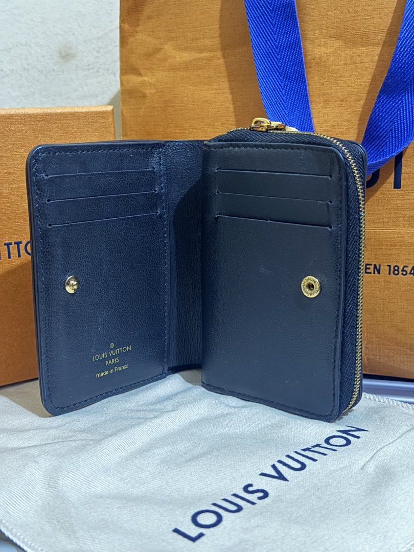 Louis Vuitton Monogram Empreinte Black Leather Zipped Wallet (Category: Luxury Bags & Wallets) located in Caloocan City. Submitted by ghlvllrmn391585 (Listing ID 1465693366, Image 3). Description: ORIGINAL LV WALLET 56,000 SRP USED ONCE THEN NADISPLAY NALANG - Authentic Louis Vuitton wallet in black leather with embossed monogram - Features gold-tone hardware and LV circle pull charm zipper - Interior includes multiple card slots and secure snap 