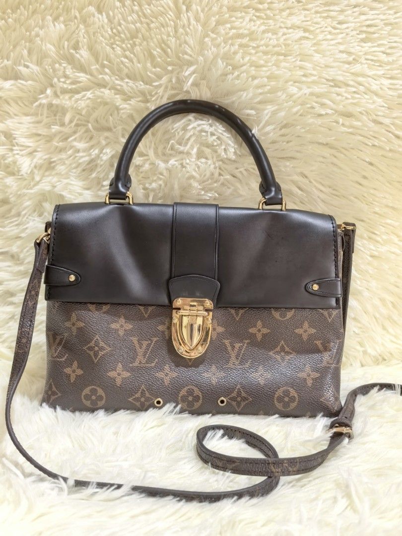 Louis Vuitton Very One Handle (Category: Luxury Bags & Wallets) located in Tacloban City. Submitted by curatedbygenz (Listing ID 1465660663, Image 1). Description: Model: Louis Vuitton Very One Handle Style: Monogram Canvas & Black Leather Hardware: Gold-tone Includes: Top handle + detachable/adjustable shoulder strap • Spacious interior with zip compartment • Can be carried by hand, on the shoulder, or crossbody • Made in France 📌 Condition: Go