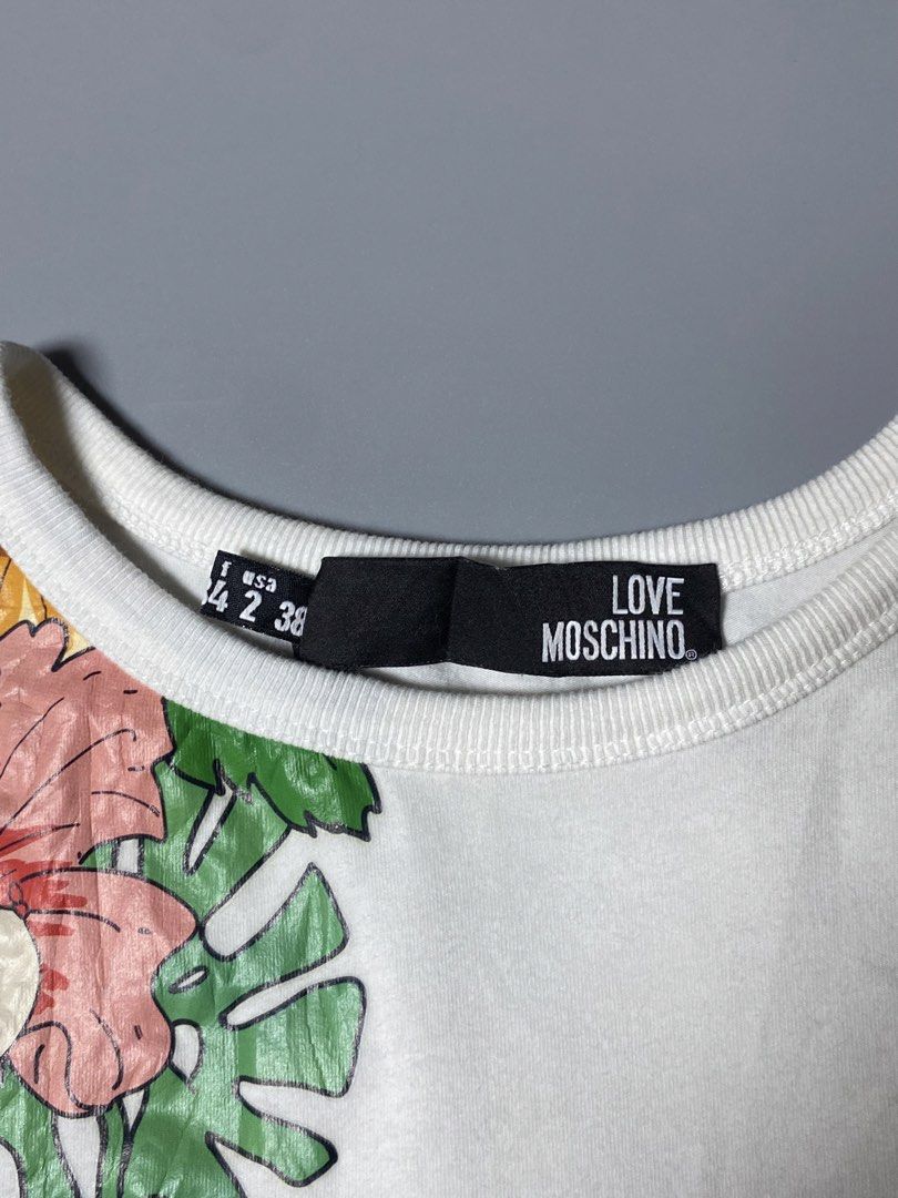 Love Moschino Floral Tee (Category: Shirts) located in Makati City. Submitted by earnx_ (Listing ID 1465629944, Image 3). Description: Love Moschino Floral Tee - Size 2 on tag - Dimension is 14.5x23 - No issue - Excellent Condition.