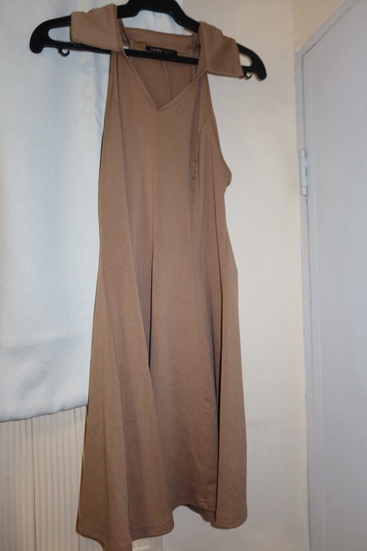 Lovito Brown Halter Neck Mini Dress (Category: Dresses) located in Cavite. Submitted by mcjkim (Listing ID 1465705323, Image 1). Description: - Brand/Style: Lovito brown halter neck dress with a flattering V-neckline and sleeveless design - Fit & Fabric: Soft, stretchy material that comfortably hugs the torso and flows into a flared A-line skirt - Condition: Worn once for a quick photo op, practically untouched and like new - Versatility: Great c
