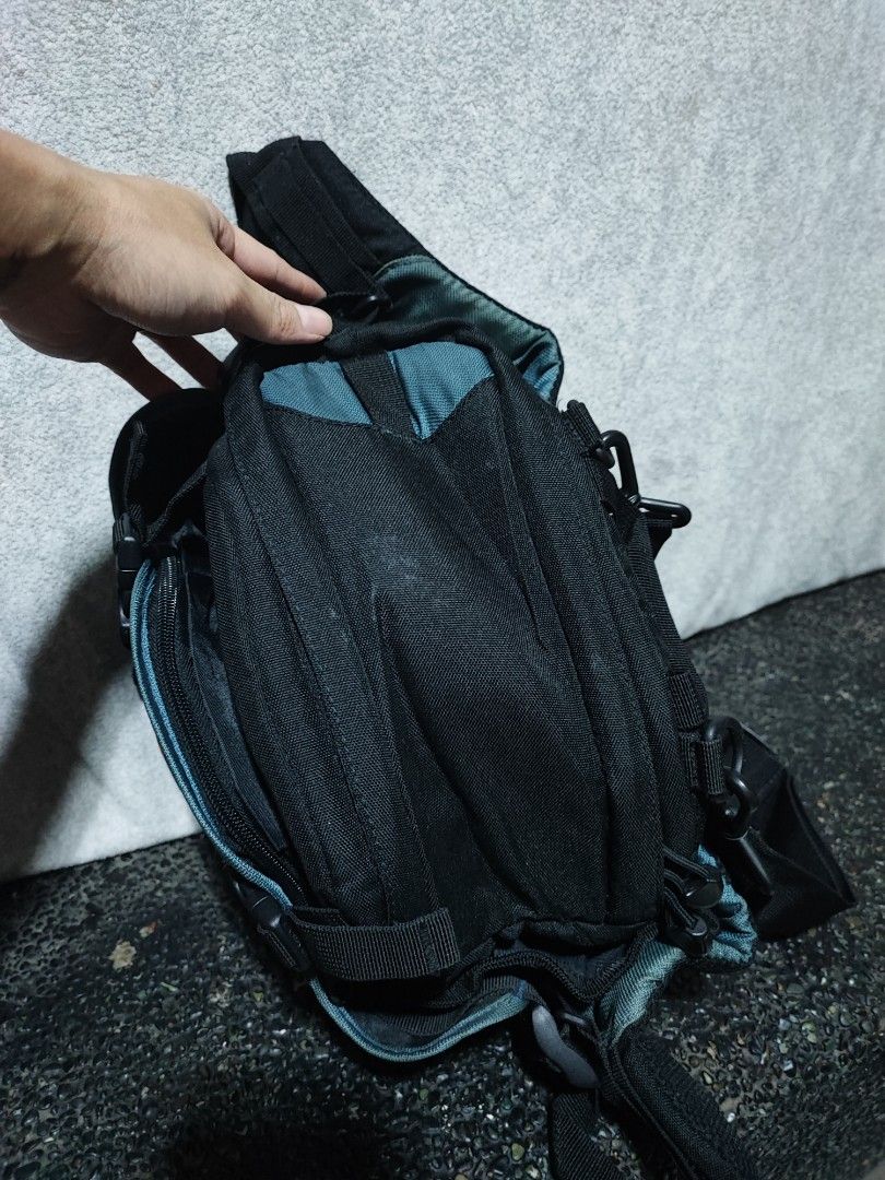 Lowepro camera waist bag with shoulder strap (Category: Camera Bags & Carriers) located in Baguio. Submitted by ozara.06 (Listing ID 1465696847, Image 3). Description: Lowepro Inverse 100 AW Camera Beltpack Capacity: 1 pro DSLR with medium zoom lens attached plus 1 additional lens or flash unit; charger and cords; filters and memory cards In very good condition with rain cover 1k.
