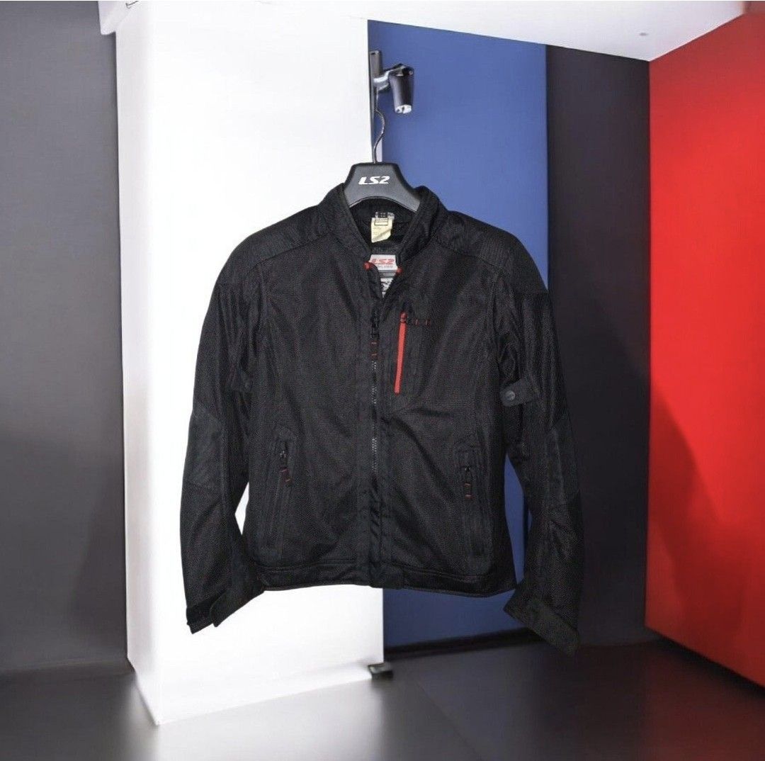 LS2 Black Mesh Riding Jacket (Category: Coats, Jackets and Outerwear) located in Imus. Submitted by emajay24 (Listing ID 1465596774, Image 1). Description: - Brand/Model: LS2 riding jacket - Color: Solid black with stylish red accents along the zipper and collar trim - Ventilation: Breathable mesh panels for maximum airflow on warm days - Storage: Full front zip closure, zippered chest pocket, and secure inner pockets - Design: Lightweight constr