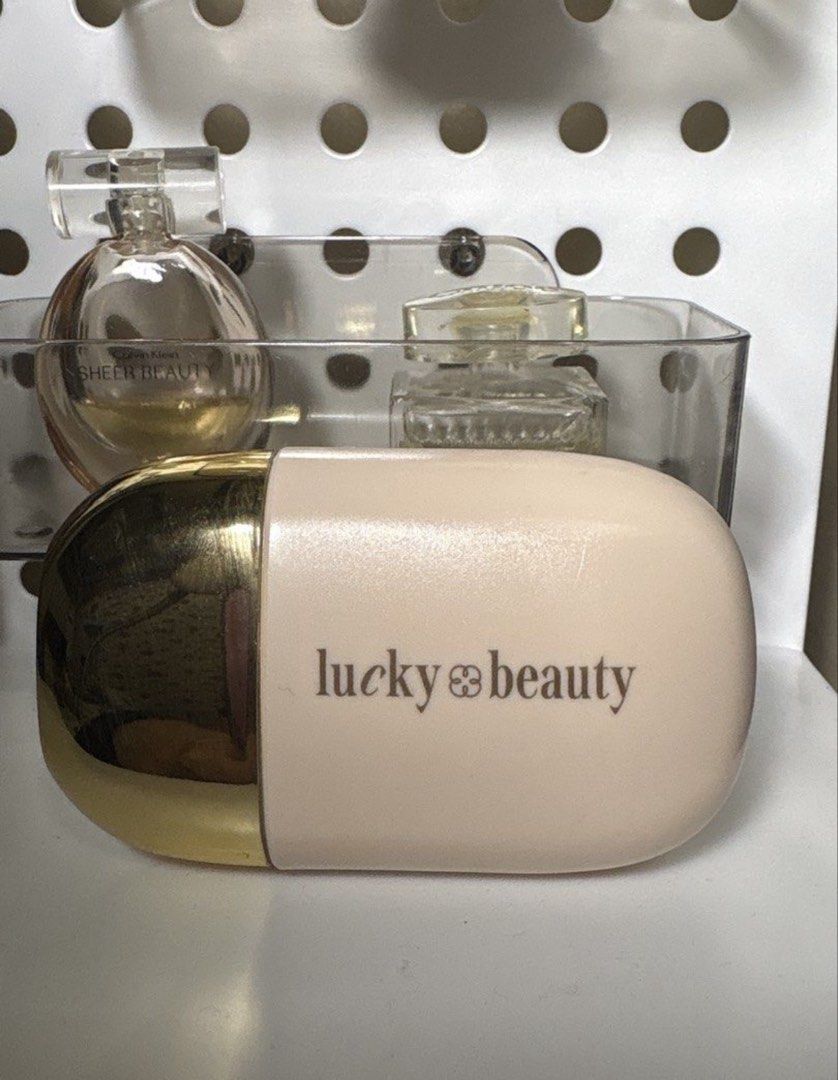 Lucky beauty Skintint (Category: Makeup) located in Taguig. Submitted by 4ly.finds (Listing ID 1465683848, Image 1). Description: - ISSUE: LEAKS - RFS: NOT MY SHADE - super puno pa neto 80-90% - used 1-2x only - old packaging pero kakabili lang nung nagbundle siya with the highlighter bottle.