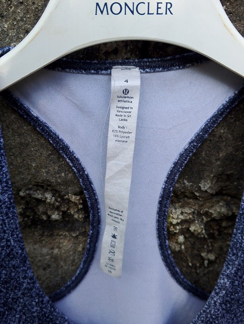 Lululemon Athletica Racerback Tank Top (Category: Activewear) located in Baliuag. Submitted by retrovault83 (Listing ID 1465675220, Image 3). Description: ✨ Condition: 9/10 – Excellent Preloved Condition 📏 Measurements (Flat Lay, Tagged Size 4): • Width: 24 - 26 • Length: 26 ✅ Details: • Authentic Lululemon Athletica racerback tank top • Heathered / speckled navy blue activewear fabric • Signature metallic silver Lululemon logo on upper back • S