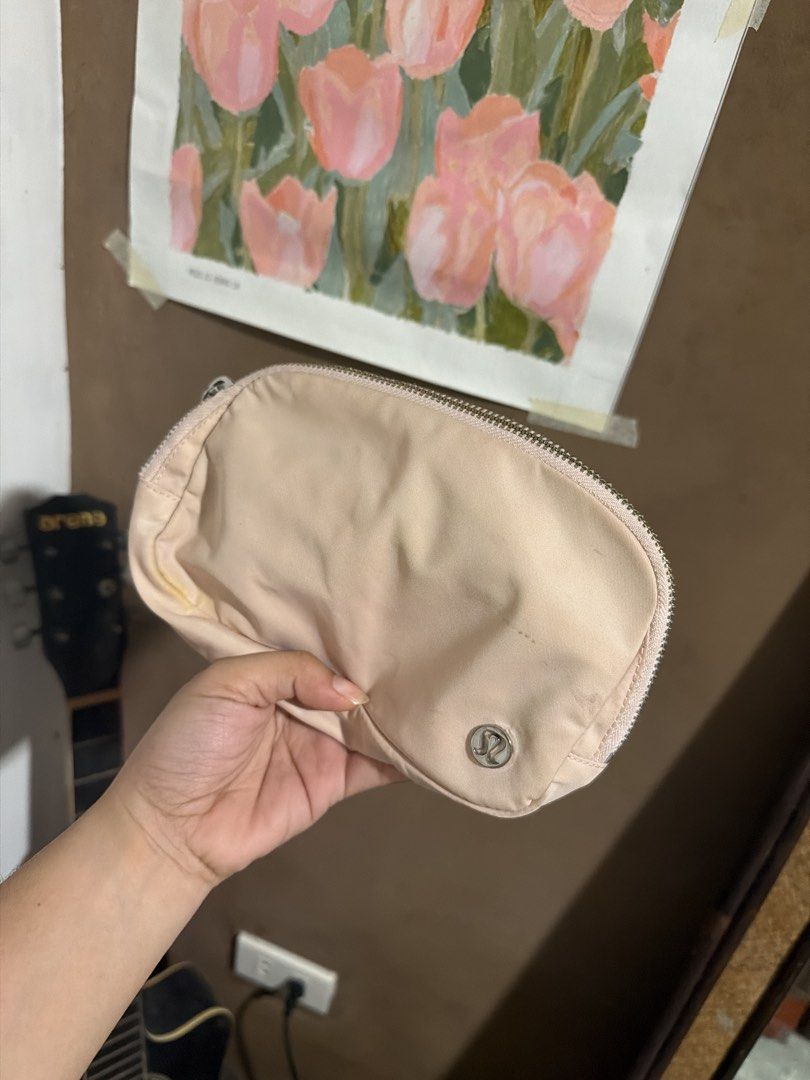 Lululemon Everywhere Belt Bag Light Pink (Category: Cross-body Bags) located in Naga. Submitted by cosmicfish.81ff28 (Listing ID 1465650481, Image 1). Description: - Authentic Lululemon Everywhere Belt Bag in a gorgeous pastel pink shade - Adjustable strap with stylish metallic Lululemon lettering - Secure main zip compartment and convenient exterior back zipper pocket - Interior mesh slip pockets to keep your items organized - Ideal size for you