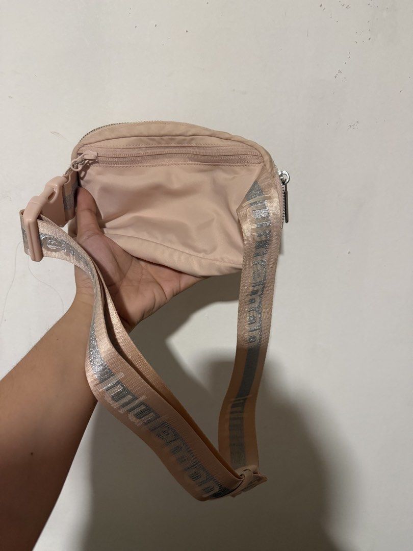 Lululemon Everywhere Belt Bag Light Pink (Category: Cross-body Bags) located in Naga. Submitted by cosmicfish.81ff28 (Listing ID 1465650481, Image 3). Description: - Authentic Lululemon Everywhere Belt Bag in a gorgeous pastel pink shade - Adjustable strap with stylish metallic Lululemon lettering - Secure main zip compartment and convenient exterior back zipper pocket - Interior mesh slip pockets to keep your items organized - Ideal size for you