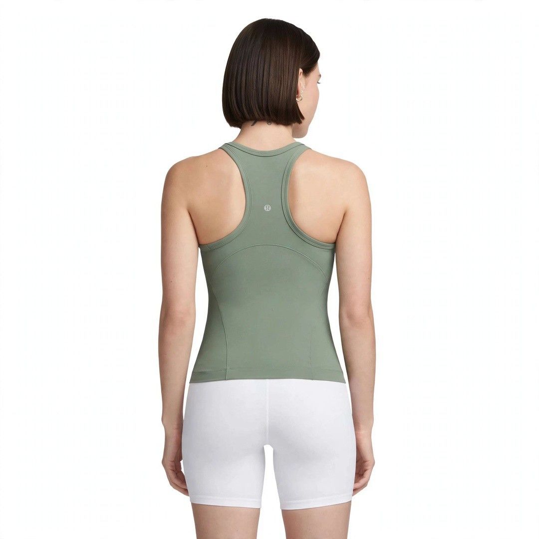 Lululemon Tank Top (Category: Activewear) located in Rizal. Submitted by timeless_shop (Listing ID 1465579752, Image 2). Description: ORIGINAL Lululemon Align Racerback Tank Top - Dark Forest - Size 6 👚 Fit to Small to Medium Frame Bust Size 32-34 🎨 Color: Dark Forest / Sage Green 🧵 Material: Nulu Fabric - buttery soft, lightweight, 4-way stretch 💯 Condition: 9.8/10 - Like New! 🎨 Color Rate: 9.8/10 - Hindi kupas, walang himulmol - Maayos at 