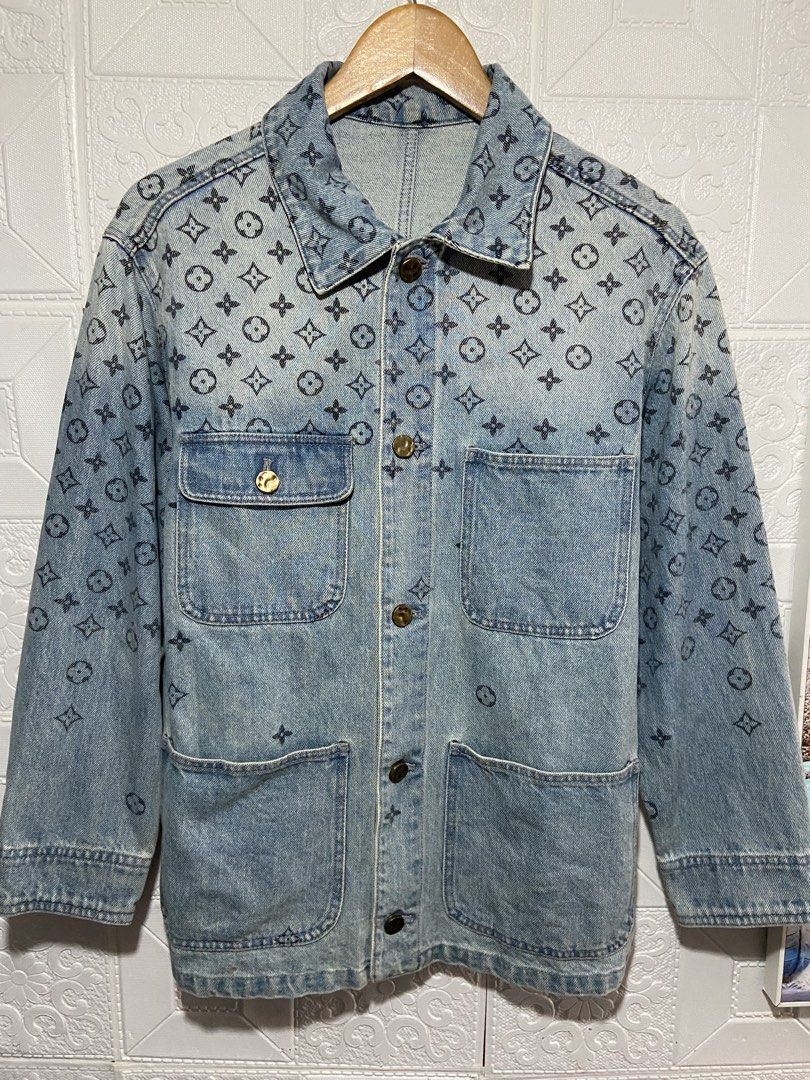LV monogram denim jacket (Category: Coats, Jackets and Outerwear) located in Baguio. Submitted by stickygarments (Listing ID 1465650949, Image 1). Description: LV monogram chore denim jacket condition:excellent large dimes:22x28 .