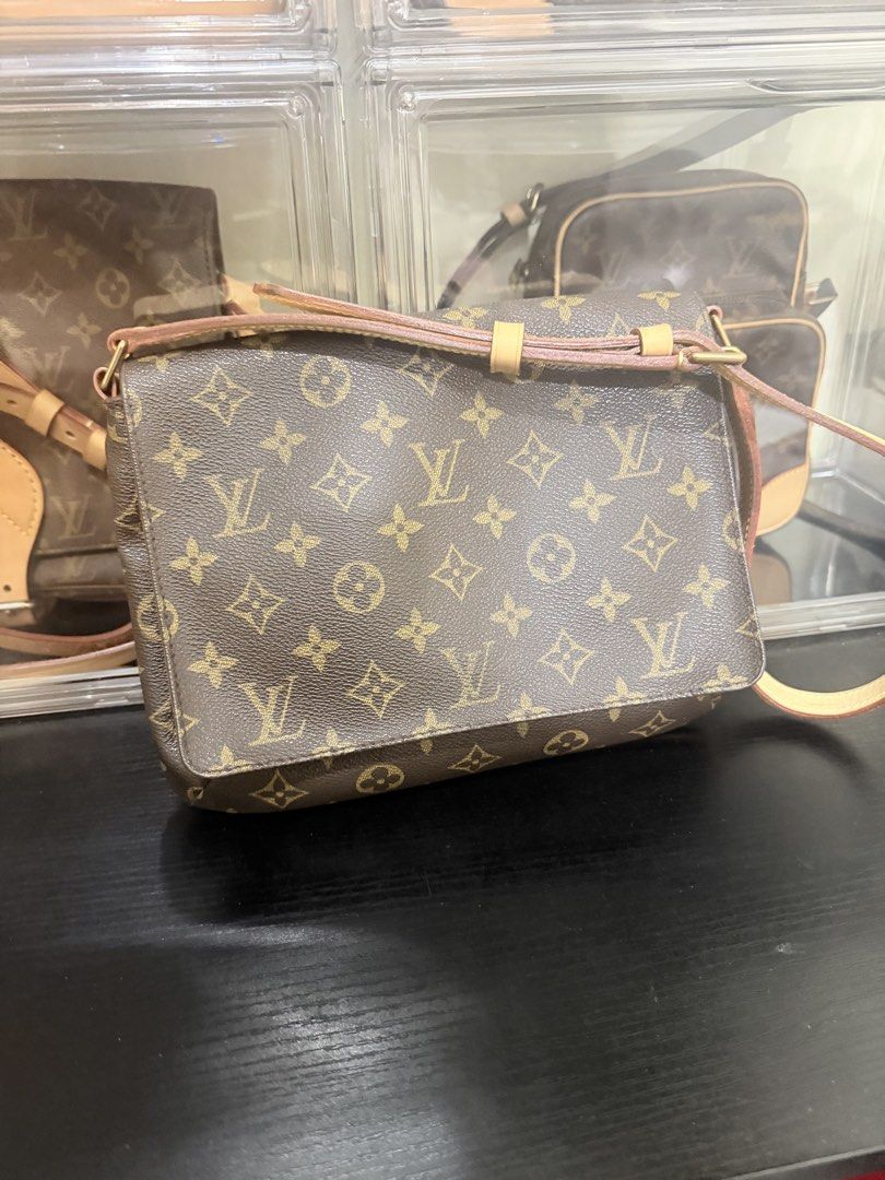 LV Musette Tango (Category: Luxury Bags & Wallets) located in Manila. Submitted by sanyatagle08878 (Listing ID 1465710276, Image 1). Description: - Classic Monogram canvas messenger bag - Adjustable Vachetta leather strap with brass buckle - Secure flap closure and smooth interior lining - Authentic Louis Vuitton Paris made in France stamp - Clean stitching along all edges and hardware.