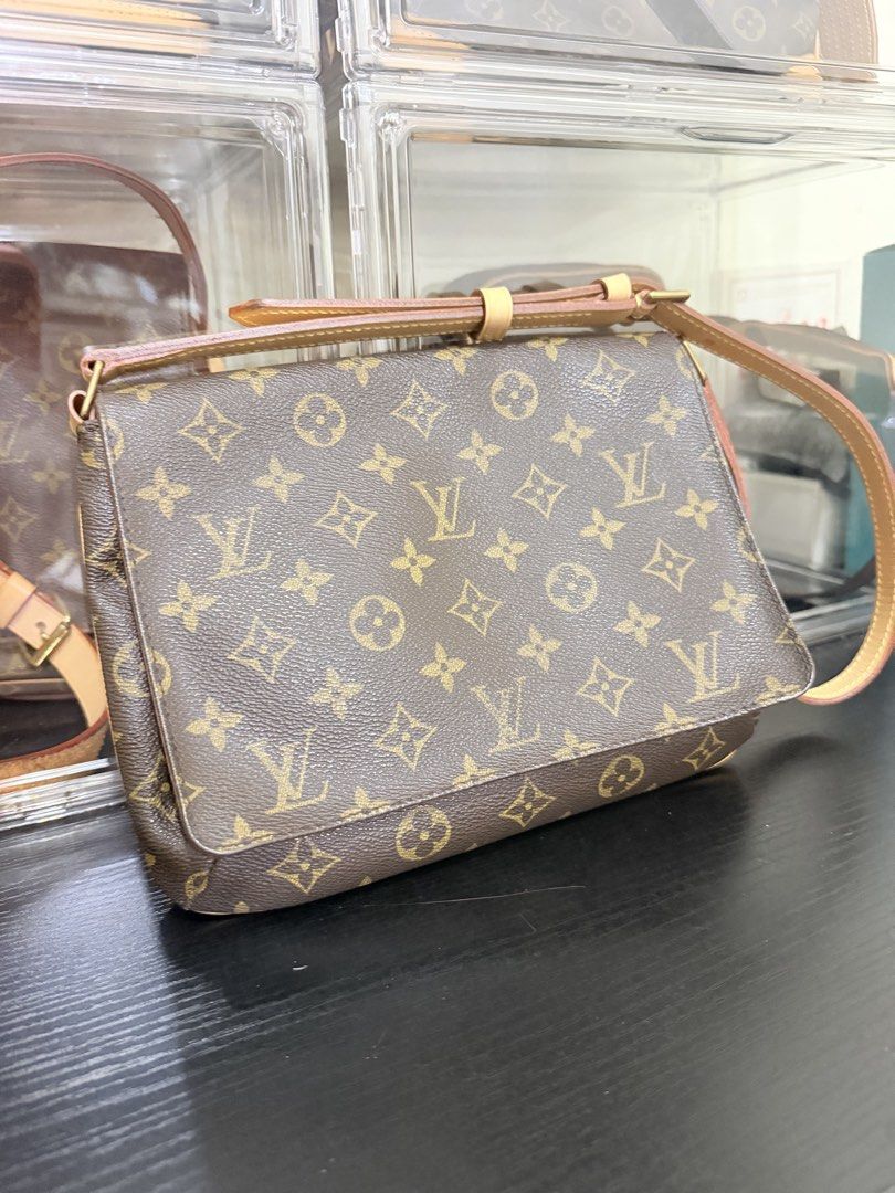 LV Musette Tango (Category: Luxury Bags & Wallets) located in Manila. Submitted by sanyatagle08878 (Listing ID 1465710276, Image 2). Description: - Classic Monogram canvas messenger bag - Adjustable Vachetta leather strap with brass buckle - Secure flap closure and smooth interior lining - Authentic Louis Vuitton Paris made in France stamp - Clean stitching along all edges and hardware.