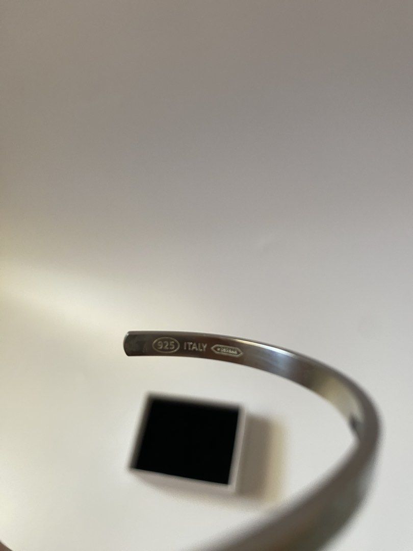 Maison Margiela Bangle (Category: Bracelets) located in Manila. Submitted by ecruos.s (Listing ID 1465620766, Image 2). Description: silver sterling engraved logo.