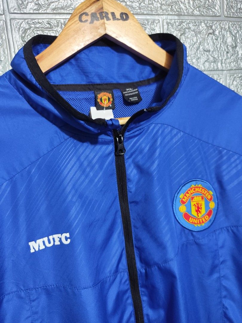Manchester United Windbreaker Jacket (Category: Coats, Jackets and Outerwear) located in San Fernando. Submitted by jzysthriftshop (Listing ID 1465604567, Image 2). Description: Size XL 26 x 31 superb condition add shipping fee.