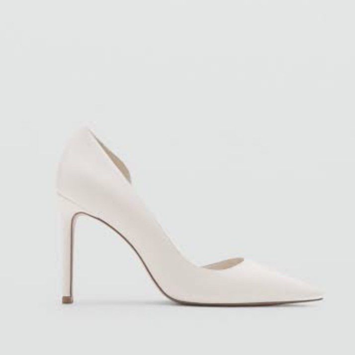 MANGO Asymmetric Stiletto Shoes White (Category: Heels) located in Davao. Submitted by oh.cake (Listing ID 1465683019, Image 1). Description: - Brand: Mango - Style: White asymmetric stiletto shoes with modern silhouette - Features: Pointed toe, slim high heel, and stylish side cutout - Sizing: Standard Mango sizing - Occasions: Ideal for parties, dinners, and formal events RFS: decluttering Price is negotiable if you're sure about taking the ite