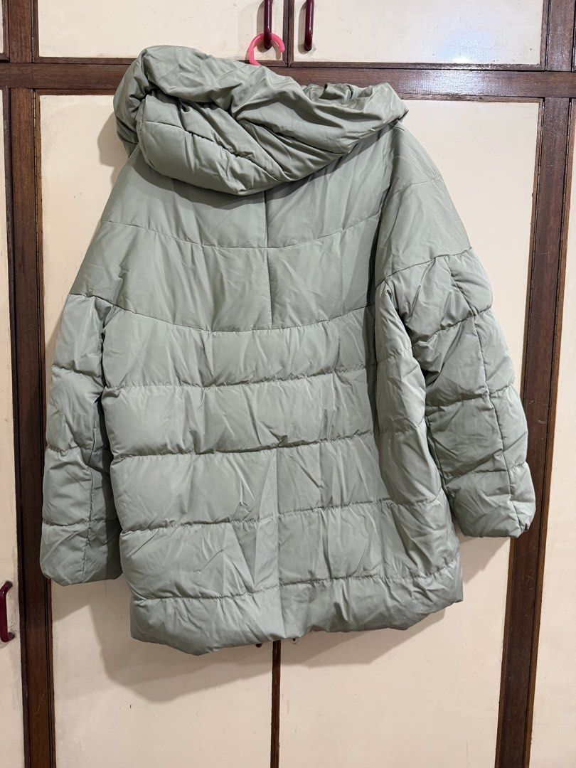 Mango Basics Sage Green Puffer Winter Jacket size Small (Category: Coats, Jackets and Outerwear) located in Manila. Submitted by preloved_new_forsale (Listing ID 1465635650, Image 2). Description: - Brand: MNG Basics - Color: Trendy sage green (neutral earthy tone) - Size: EUR S / USA XS / MEX CH - Design: Quilted horizontal pattern with high funnel neck and snap button closure - Fit: Oversized fit with long sleeves - Condition/Origin: Made in My