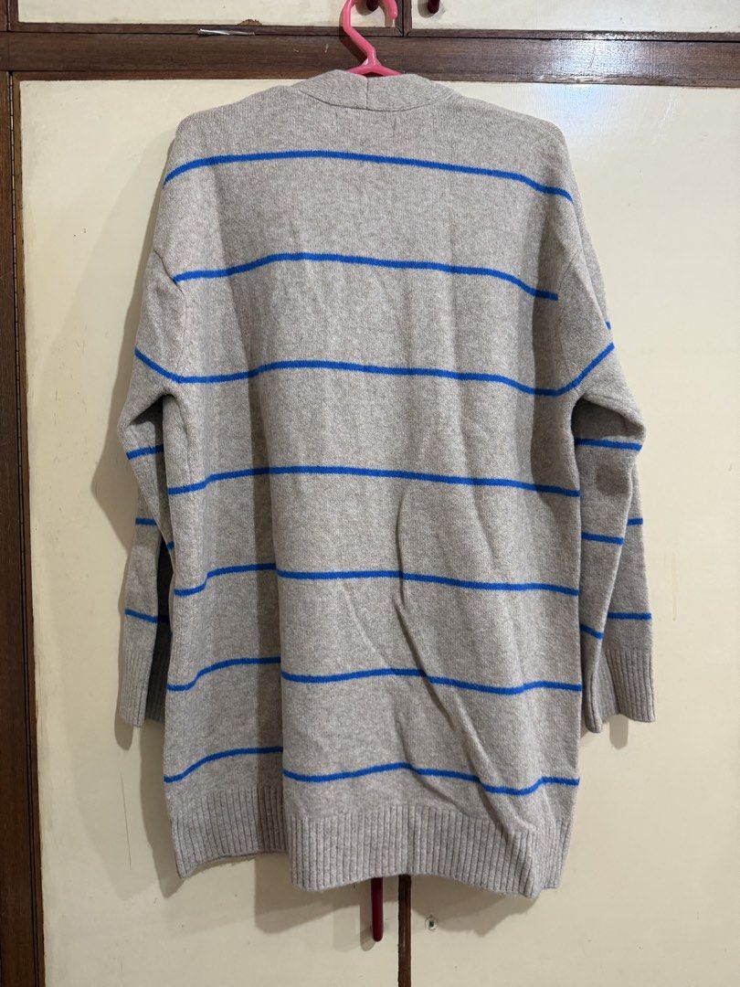 Mango MNG Striped Oversized Cardigan Medium (Category: Coats, Jackets and Outerwear) located in Manila. Submitted by preloved_new_forsale (Listing ID 1465637839, Image 2). Description: - Brand: MNG - Size: M - Color: Beige with bright blue horizontal stripes - Style: Open-front V-neck cardigan with tortoiseshell buttons - Details: Two front patch pockets, long sleeves, ribbed cuffs and hem - Fit: Relaxed and slouchy - Origin: Made in China.