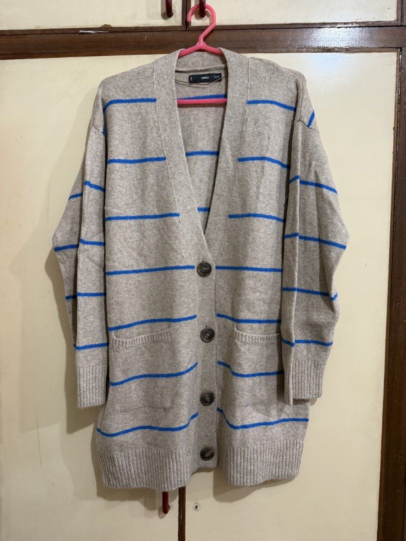Mango MNG Striped Oversized Cardigan Medium (Category: Coats, Jackets and Outerwear) located in Manila. Submitted by preloved_new_forsale (Listing ID 1465637839, Image 1). Description: - Brand: MNG - Size: M - Color: Beige with bright blue horizontal stripes - Style: Open-front V-neck cardigan with tortoiseshell buttons - Details: Two front patch pockets, long sleeves, ribbed cuffs and hem - Fit: Relaxed and slouchy - Origin: Made in China.