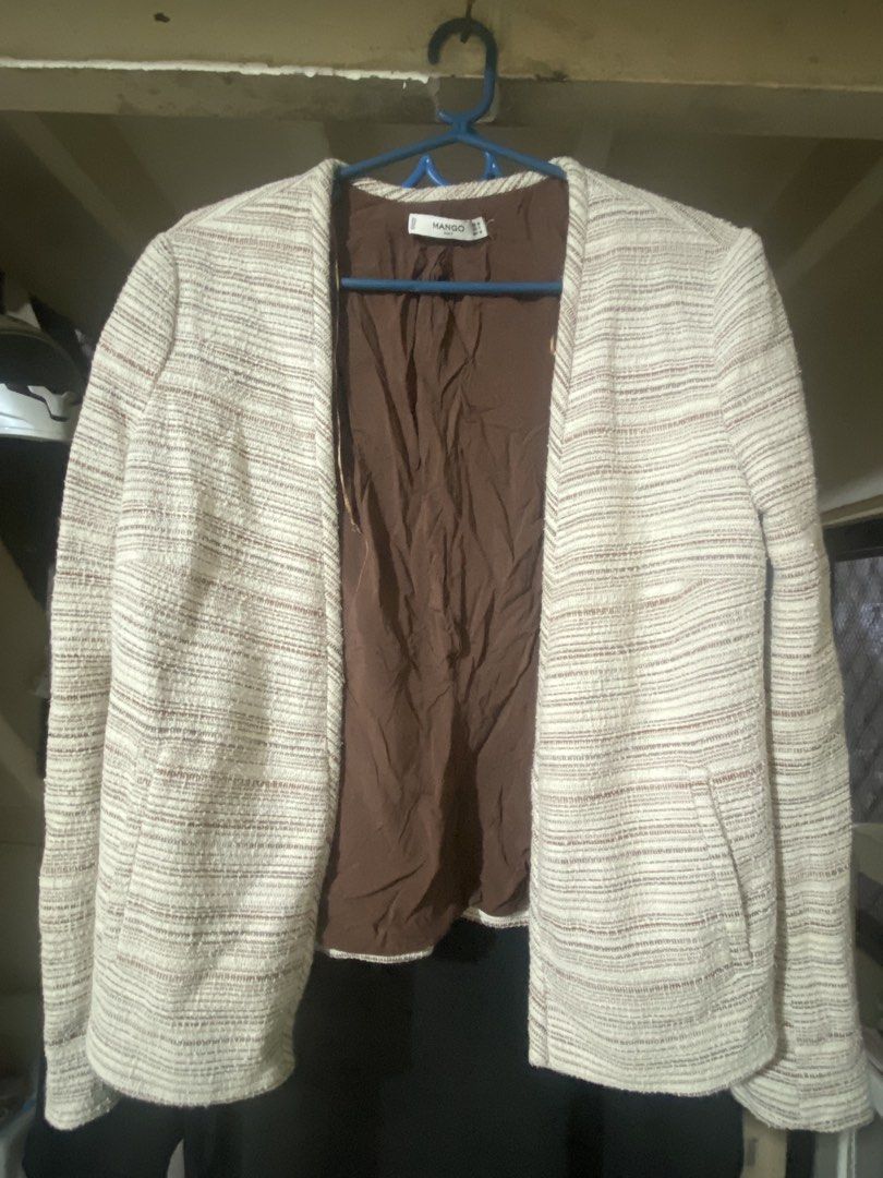 Mango Striped Tweed Open Front Jacket (Category: Coats, Jackets and Outerwear) located in Nagcarlan. Submitted by fiercewater-40fb (Listing ID 1465719829, Image 1). Description: - Brand: Mango - Design: Cream and brown stripes with tweed texture - Style: Open front, structured shoulders, and functional front pockets - Lining: Fully lined in solid brown fabric - Fit & Feel: Lightweight and easy to layer - Occasion: Perfect for workwear, smart-casu