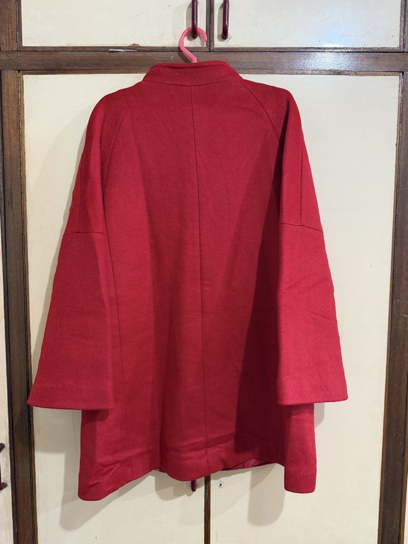 Mango Suit Red Winter Coat Jacket EUR M (Category: Coats, Jackets and Outerwear) located in Manila. Submitted by preloved_new_forsale (Listing ID 1465634782, Image 2). Description: - Brand: MNG Suit - Size: EUR M / USA S / MEX M - Color: Bright red - Material: Clean structured wool-blend, fully lined - Design: Stand collar with front snap button closure - Pockets: Two deep front pockets - Fit: Long sleeves, relaxed and cozy fit.