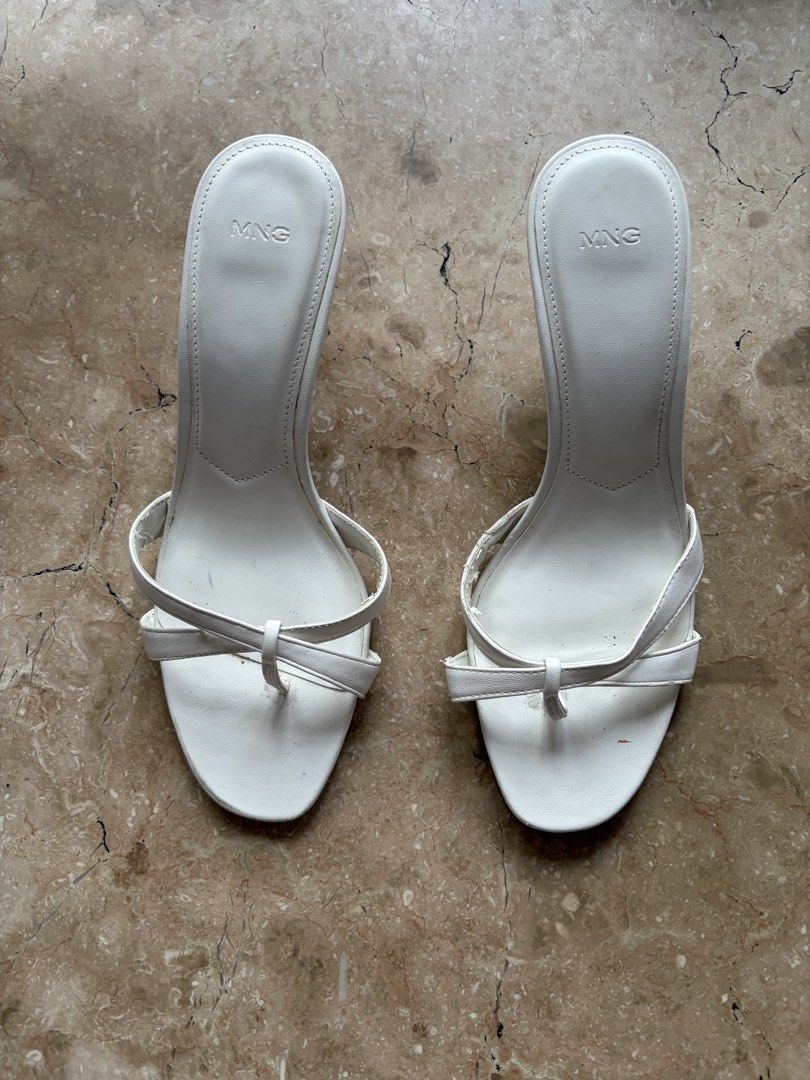 Mango Thong Heeled Mules, White (Category: Heels) located in Quezon City. Submitted by tidyup.lara (Listing ID 1465700850, Image 1). Description: Sold as is EU 38 Condition 8/10: used but in good condition, with inner peeling seen in photos.