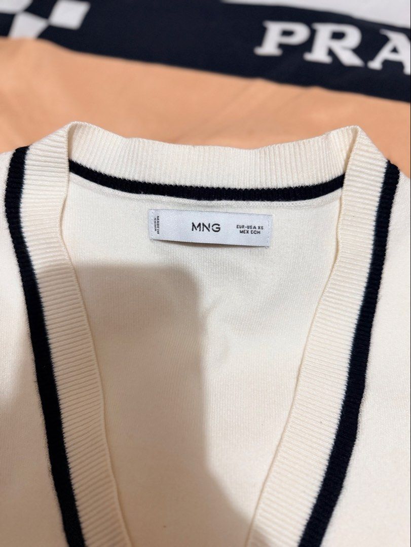 MANGO V-Neck Knit Sweater Offwhite (Category: Longsleeves) located in Manila. Submitted by aemax.cgtrading (Listing ID 1465724461, Image 3). Description: Smooth knit Loose fit (Im size S) .