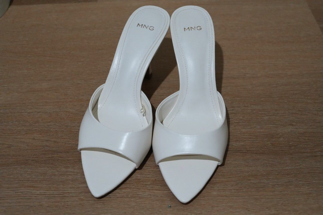 Mango White hells (Category: Heels) located in Cainta. Submitted by karsssss (Listing ID 1465756888, Image 3). Description: - Brand/Model: Mango white heels - Size: EU 37 - Style: Pointed toe with easy slip-on design - Heel: Comfortable kitten heel, very easy to walk in .