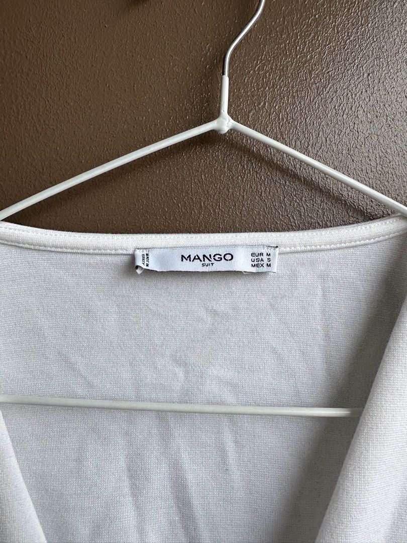 Mango White Wrap Front Top with Tie (Category: Blouses) located in Pasig City. Submitted by afterglowpreloved (Listing ID 1465614601, Image 3). Description: .