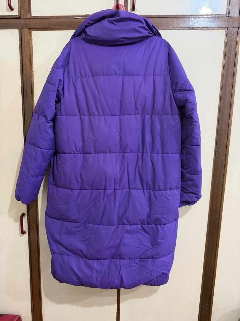 Mango Winter Puffer Jacket Coat Size XS (Category: Coats, Jackets and Outerwear) located in Manila. Submitted by preloved_new_forsale (Listing ID 1465633730, Image 3). Description: - Brand: Mango Basics - Color: Vibrant Purple - Size: EUR XS/S (USA XXS/XS, MEX ECH/CH) - Style: Mid-length puffer coat with high collar and front tie detail - Features: Warm quilted design and deep side pockets - Origin: Made in China - Condition: Great winter jacket 