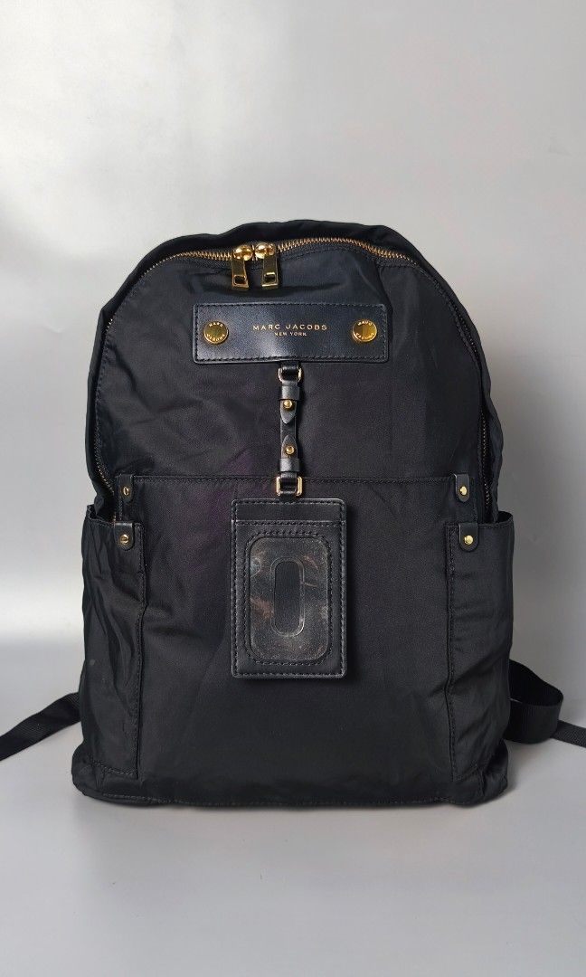 Marc Jacobs Nylon Backpack (Category: Luxury Bags & Wallets) located in Bulacan. Submitted by 4kcollection (Listing ID 1465734277, Image 1). Description: Marc Jacobs Nylon Backpack Pre-loved from Japan 🇯🇵 Excellent Condition Size: Medium Ykk Zip H'15 x L'12.5 x W'5 Inches Black na Black No flaws Dm for sure buyer 📩 MOP: Gcash / Maya / BPI Courier: J&t / Lbc / Lalamove Location: SJDM Bulacan.