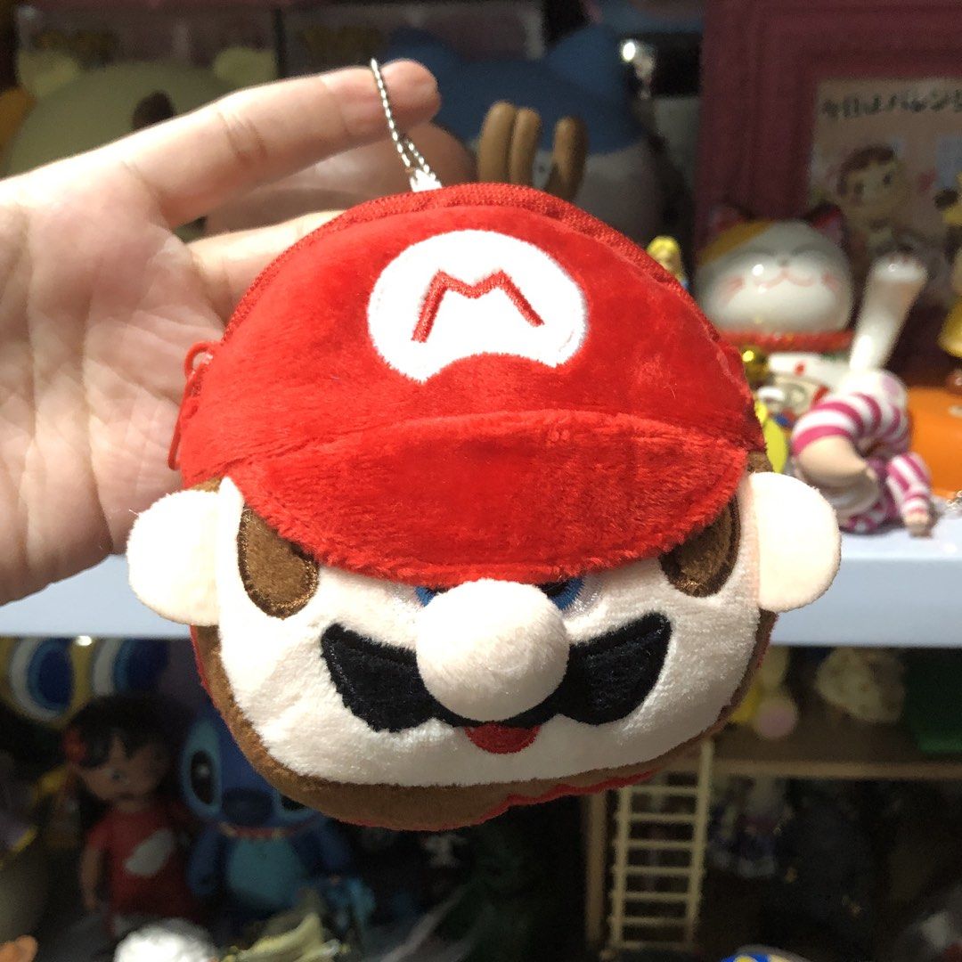 Mario Bros. Coin Purse Charm (Category: Plushies & Soft Toys) located in Quezon City. Submitted by kitsune.treasures (Listing ID 1465652673, Image 1). Description: *First to pay policy! *1 day reservation only. Failure to pay on time, auto cancel. 📍Quezon City * MOD: J&T | Lalamove * MOP: GCASH | BPI 📦ON HAND AND READY TO SHIP! CONDITION: WHAT YOU SEE IS WHAT YOU GET. Dimensions: Kindly check the photos for the actual measurements. Please check