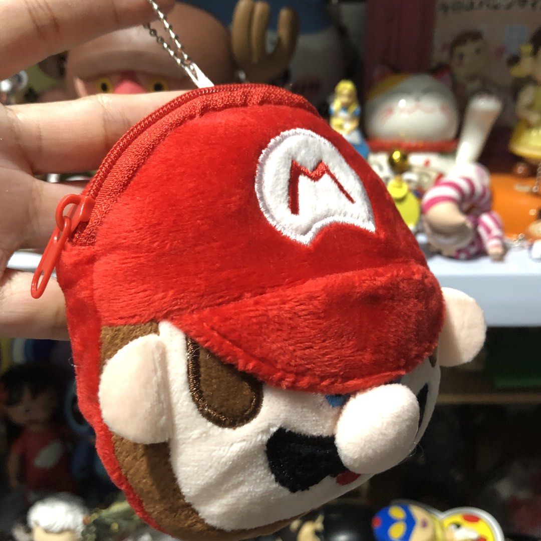 Mario Bros. Coin Purse Charm (Category: Plushies & Soft Toys) located in Quezon City. Submitted by kitsune.treasures (Listing ID 1465652673, Image 2). Description: *First to pay policy! *1 day reservation only. Failure to pay on time, auto cancel. 📍Quezon City * MOD: J&T | Lalamove * MOP: GCASH | BPI 📦ON HAND AND READY TO SHIP! CONDITION: WHAT YOU SEE IS WHAT YOU GET. Dimensions: Kindly check the photos for the actual measurements. Please check