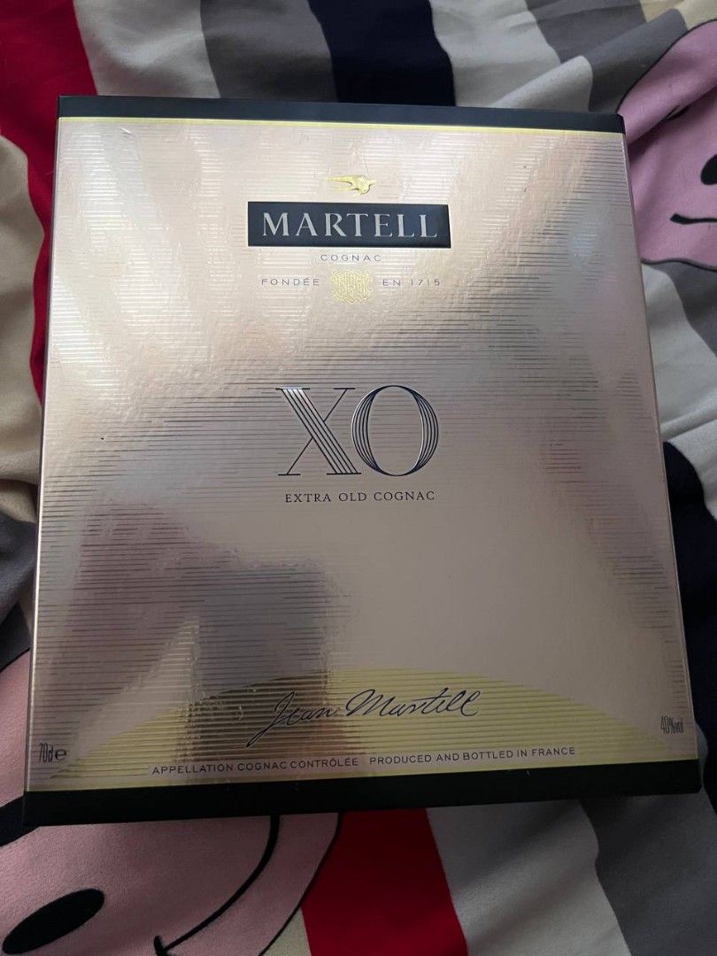 Martell XO Extra Old Cognac 70cl (Category: Beverages) located in Quezon City. Submitted by thessyang (Listing ID 1465648483, Image 1). Description: OFFER PRICE RUSH!!! - Item: Martell XO Extra Old Cognac - Volume: 70cl (700ml) - Alcohol Content: 40% ABV - Origin: Product of France (Appellation Cognac Contrôlée) - Condition: Brand new, unopened in original black and gold collector's box - Perfect for gifting, special occasions, or cognac connoiss