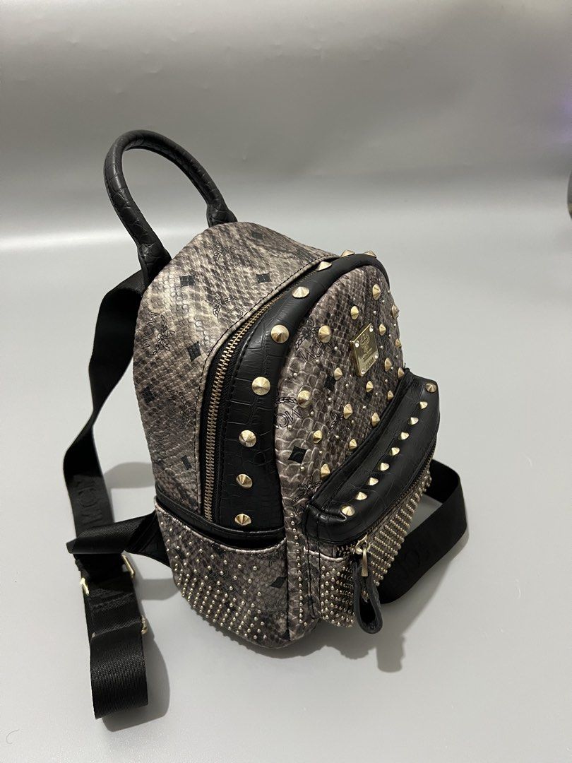MCM - Snake Skin - Backpack (Category: Beach Bags) located in Cavite. Submitted by asianluxe (Listing ID 1465704589, Image 2). Description: MCM Measurements! Length:10 inches Width:8 inches Depth:4.5 inches Excellent condition Very presentable No flaw or dmage.