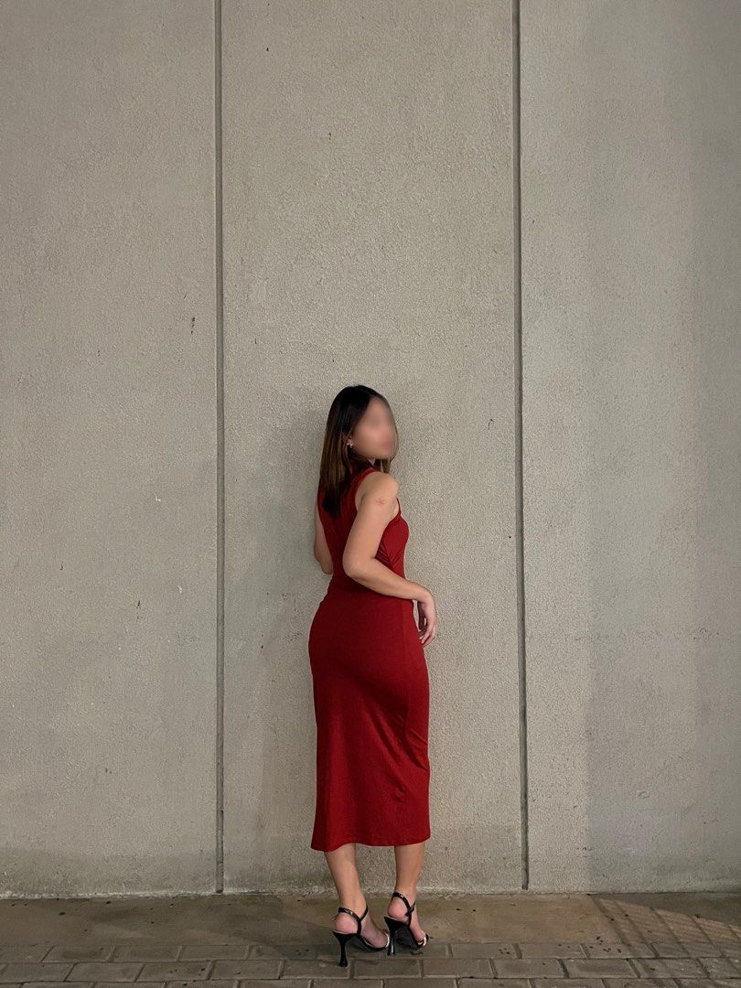 Medium, Red Bodycon Maxi Dress (Category: Dresses) located in Dasmarinas. Submitted by ohsnap_ (Listing ID 1465612551, Image 3). Description: - Brand: H&M Divided - Size: M (Bodycon) - Color: Red - Length: Maxi - Design: Sleeveless with a chic front twist cutout at the neckline - Material: Smooth and stretchy for a comfortable fit.