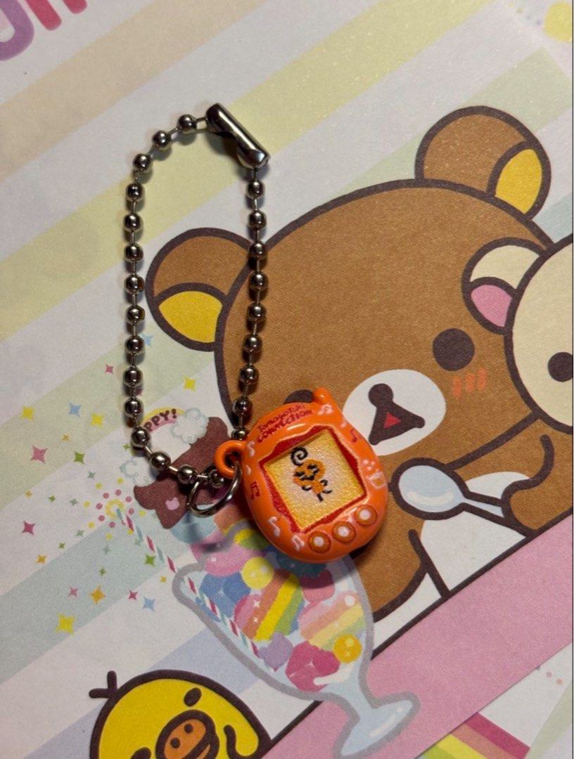 Memetchi Tamagotchi Keychain (Category: Vintage Collectibles) located in San Juan City. Submitted by glitznpops.ph (Listing ID 1465389831, Image 1). Description: .