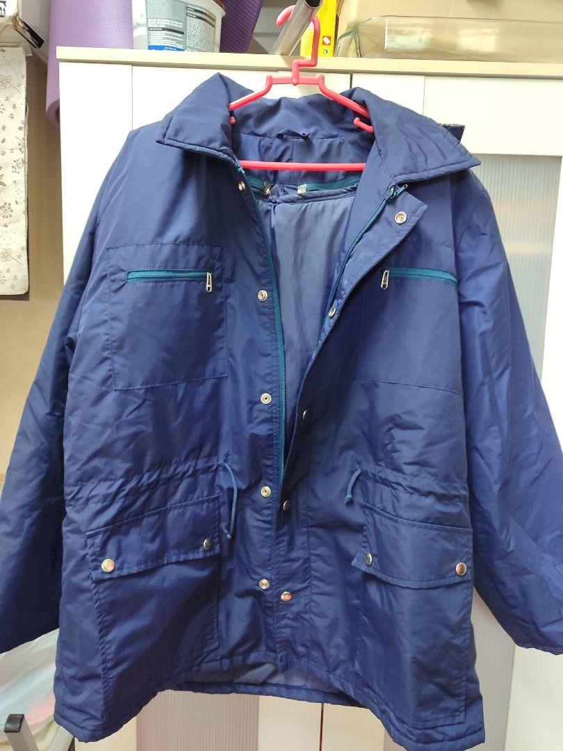 Men's Blue Winter Jacket with Hood and Multiple Pockets (Category: Coats, Jackets and Outerwear) located in Mandaluyong City. Submitted by thethrifthaul (Listing ID 1465758889, Image 1). Description: - Color: Blue -Feature: Removable Inner themal layer - Pockets: Multiple exterior pockets plus an inner pocket with bright blue thermal lining - Fit: Adjustable drawstrings at the waist - Hood: Features a stylish grey plaid lining - Condition/Use: Wa