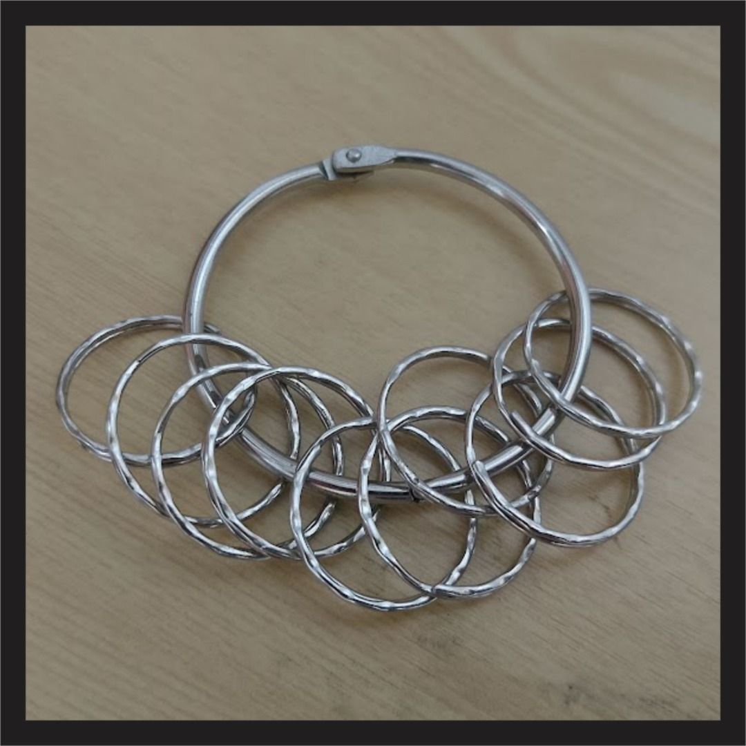 Metal Ring Sizer Set with Holder Ring (Category: Accessory Holder, Box & Organizers) located in Quezon City. Submitted by susmaryosep1 (Listing ID 1465651685, Image 1). Description: - Metal ring sizer set for accurate measurements - Includes multiple thin metal bands on a secure clasp ring - Ideal for jewelry making or checking ring sizes at home - Clean condition with no major scratches or damage 250.