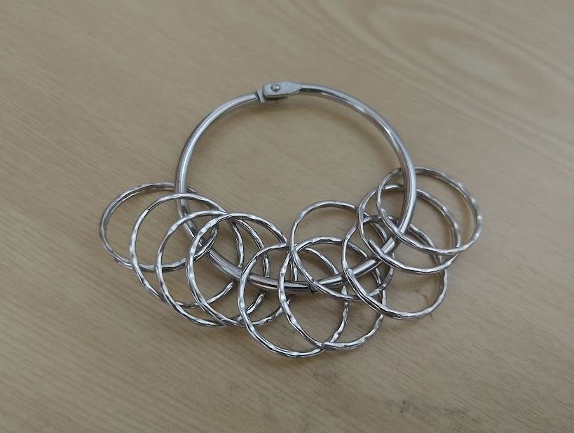 Metal Ring Sizer Set with Holder Ring (Category: Accessory Holder, Box & Organizers) located in Quezon City. Submitted by susmaryosep1 (Listing ID 1465651685, Image 2). Description: - Metal ring sizer set for accurate measurements - Includes multiple thin metal bands on a secure clasp ring - Ideal for jewelry making or checking ring sizes at home - Clean condition with no major scratches or damage 250.