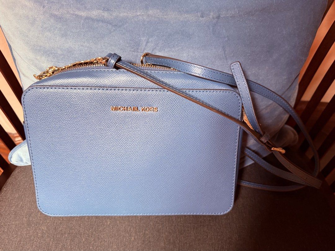 Michael Kors (Category: Cross-body Bags) located in Quezon City. Submitted by patriciach (Listing ID 1465652303, Image 1). Description: Original Michael Kors cross body bag leather bag Color : DUSTY BLUE.